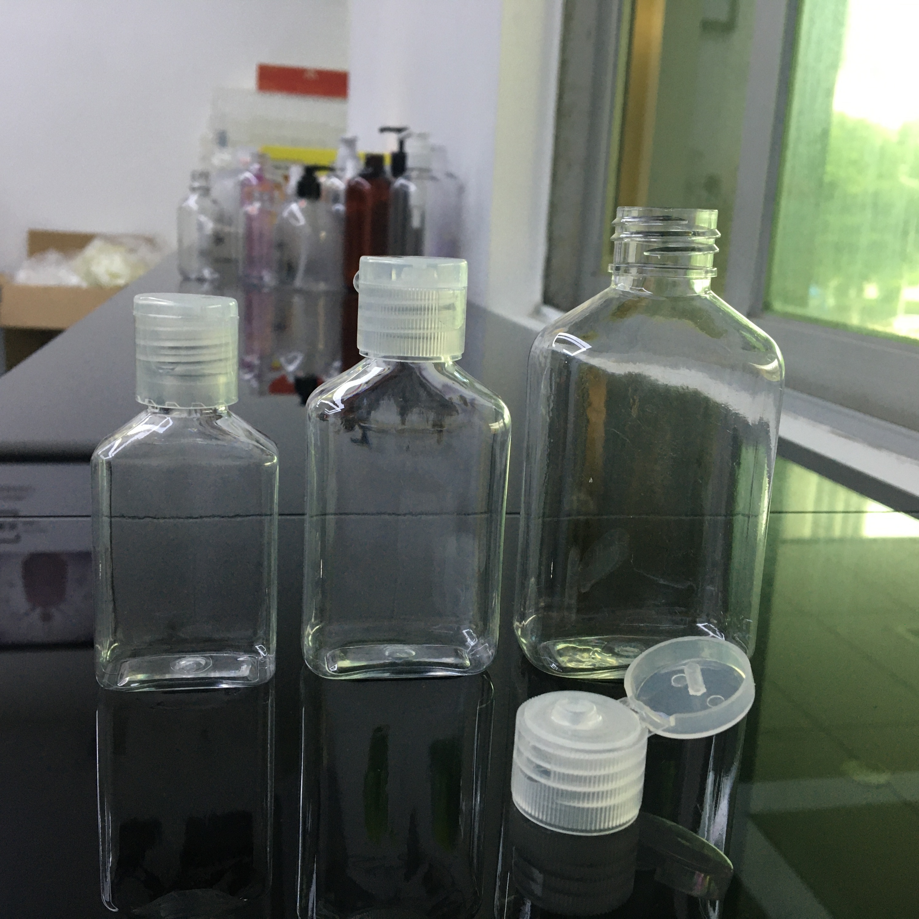 Botella de mascota con claro tapa flip top 30 ml 50 ml 100ml para botella de desinfectante de manos alcohol entrega rápida