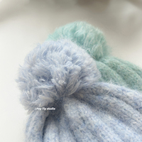 Chapeau en laine tricotée multifonctionnel avec pompon en peluche pour l'automne et l'hiver, chapeau chaud et protecteur pour les oreilles, chapeau contre le froid pour femmes