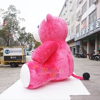 Mascotte géante de la Saint-Valentin en forme d'ours en peluche rose gonflable pour la décoration extérieure.