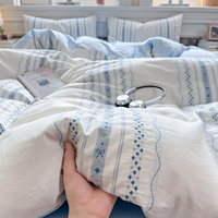 Ensemble de housse de couette rayée verticale 100% coton 4 pièces, literie minimaliste à petits nœuds et rayures avec options multicolores