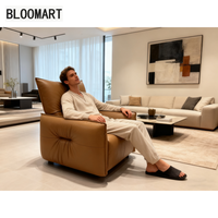 Chaise pivotante inclinable en cuir avec cadre en bois éponge intégrée dans le moteur en acier au carbone noir mat plateau tournant canapé meubles