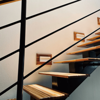 Escalier flottant résidentiel haut de gamme Orient Stair avec rampe en fer forgé