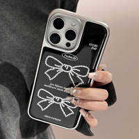 Coque de téléphone Ins Bow Tie noire dorée pour iPhone 16, 16 Pro Max/Plus/Pro, 15, 15 Pro Max/Plus/Pro, 14 Pro Max/Plus/Pro, 14, 13, 13 Pro Max, 13 Pro, 12, 11