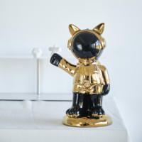 Nouvel arrivage de statue d'astronaute plaqué or noir décoration de bureau créative ornements en céramique
