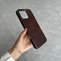 Étui de téléphone en cuir véritable en gros avec boutons métalliques et cadre de caméra surélevé pour 16 Pro – Design de luxe, antichoc magnétique