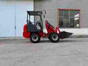 Nouveau design Mini chargeuse sur pneus électrique Capacité de 800kg Chargeur frontal avec roulement et moteur à piles - Product Image 2