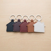 Porte-clés en forme de maison en cuir PU, portable, multifonctionnel, décoratif, breloque promotionnelle pour sac, cadeau pour agents immobiliers