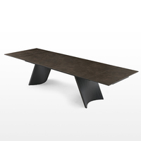 Table à manger rectangulaire extensible en pierre frittée avec pieds en acier au carbone au design unique, très vendue pour la maison