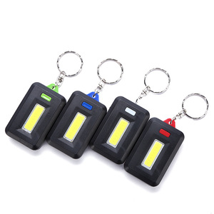 ไฟฉายพวงกุญแจ LED COB ขนาดเล็ก พกพาสะดวก สำหรับตั้งแคมป์กลางแจ้ง มีสีให้เลือก ขาว แดง เขียว น้ำเงิน ใช้พลังงานจากแบตเตอรี่ - Product Image 1