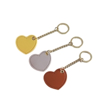 Nouveau porte-clés en cuir PU personnalisé en forme de cœur, gravé au laser, avec logo imprimé, breloque de sac personnalisée
