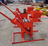 La machine à fabriquer des briques écologiques interverrouillées manuelles QMR2-40 la moins chère au Brésil