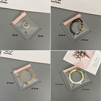Emballage d'accessoires de bijoux en plastique souple, vente en gros, matériau PE, sac de rangement pour bijoux transparent imperméable avec fermeture éclair pour bracelets