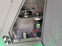 Machine de transfert DTF à double tête XP600/I3200A1 avec circulation d'encre blanche pour la personnalisation des vêtements