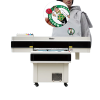 Nouvelle arrivée : machine d'impression de badges à grande vitesse à 4 têtes, machine à plat UV, imprimante UV 3D pour logo sur jersey en TPU