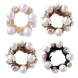 Accessoires de mode capillaires populaires européens et américains pour femmes : élastiques à cheveux en perles, élastiques à chignon, élastiques à cheveux en strass. - Product Image 1