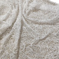 Tissu en dentelle blanche brodée suisse pour robe de mariée et robe femme – Grande Vente