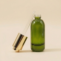 Flacon en verre dépoli mat de luxe à fond épais avec compte-gouttes à bouton poussoir doré pour sérum, huile et cosmétiques, impression sérigraphique