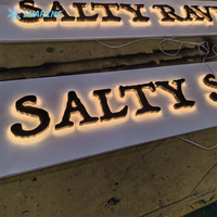 Lettres en relief rétroéclairées par LED blanc chaud, enseigne en métal 3D personnalisée avec halo lumineux pour façade de magasin commercial