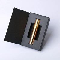 Vente en gros de flacons de parfum en verre miniatures portables rechargeables de 3 ml, 5 ml, 10 ml, 15 ml, finition mate, noir, or, argent, avec boîte en papier
