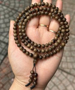 สร้อยข้อมือไม้กฤษณาเวียดนามคุณภาพสูง 108 เม็ด ขนาด 6 มม. ทำจากไม้กฤษณาสีดำธรรมชาติแท้ คุณภาพเยี่ยม - Product Image 1