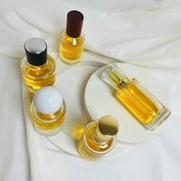 Pulvérisateur de parfum rond personnalisé de 50ml atomiseur vide bouteille en verre de parfum pour hommes avec bouchon en forme de boule de fond de montagne de neige de volcan
