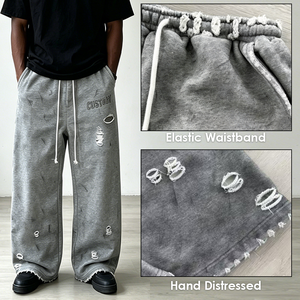 Pantalon de survêtement large pour homme, effet usé et déchiré, taille effilochée, ourlet brut, coupe ample, cordon de serrage, style streetwear, personnalisable OEM - Product Image 2