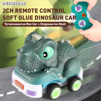 Vente en gros de voitures de dinosaures RC simulées en plastique souple avec roues en caoutchouc, télécommandées, avec lumière et musique, pour enfants