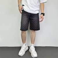Pantalon décontracté de sport d'été de marque tendance pour hommes Nouveau short en jean de style américain Taille moyenne Bouton mince respirant Grande taille