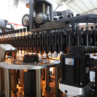 Machine de soufflage de préformes PET entièrement automatique à chauffage intégré pour usine d'eau potable