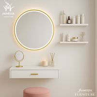 Ensemble de meuble-lavabo mural contemporain avec miroir LED de forme irrégulière et éclairage d'ambiance, coiffeuse flottante, mobilier de chambre moderne