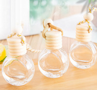 Diffuseur rechargeable de 10 ml avec bouchon en bois naturel, flacon de parfum rond à suspendre dans la voiture avec corde tressée