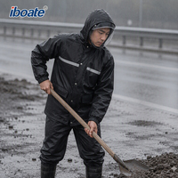 Veste de pluie réfléchissante imperméable en polyester haute densité respirant avec capuche noire pour le travail en extérieur