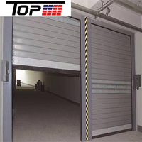 Porte de garage enroulable commerciale avec fonctionnement motorisé pour usine et atelier