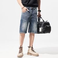 Jeans décontractés pour hommes à la mode de rue jambe large demi-pantalon bas court design baggy