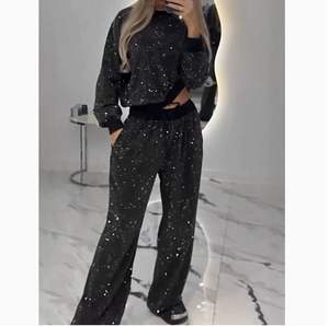 Set 2 potong atasan wanita lengan panjang, kerah bundar, longgar, dengan tali serut dan celana lebar, model Eropa dan Amerika untuk musim gugur dan dingin. - Product Image 1