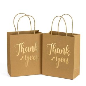 Sacs en <span class=keywords><strong>papier</strong></span> kraft personnalisés en gros avec poignée, estampage à chaud, recyclables, essentiels pour les cadeaux raffinés - Product Image 1