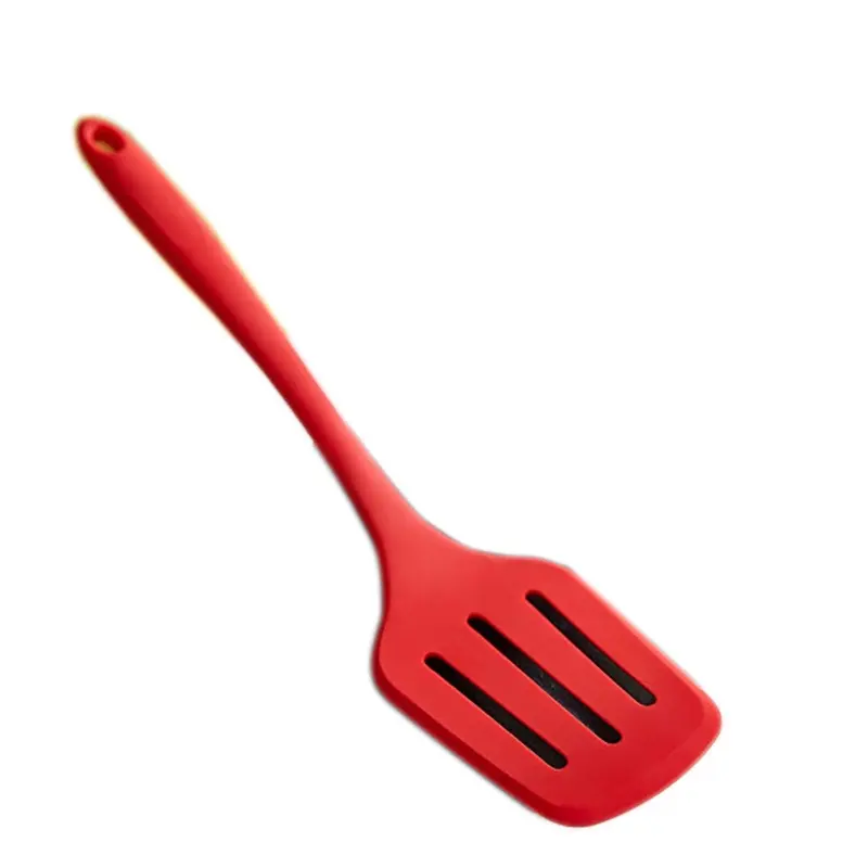 Nueva moda antiadherente Turner grado alimenticio cocina ranurada espátula utensilio de cocina silicona Turner cuchara de silicona roja