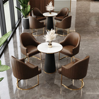 Ensemble de mobilier de restaurant moderne et luxueux, respectueux de l'environnement, table et chaises de café, pieds en acier inoxydable doré, cuir PU, école