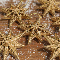 6 pendentifs muraux en métal doré en forme d'étoile à huit branches, mini décorations d'étoiles dorées pour les décorations de sapin de Noël