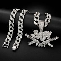 Collier pendentif double pistolet « BABY » en strass dorés audacieux avec chaîne cubaine « Iced Out » pour homme, bijoux de mode Hip Hop Streetwear
