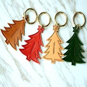 Leather Christmas Tree Keychains Embossed Merry Christmas Design Red Brown Green Gold Ring Customized <b>Holiday</b> Decor - Product Image 1
