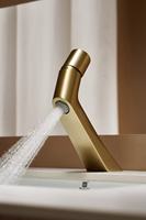 Robinet de lavabo moderne élégant et créatif en or brossé à un seul trou avec cartouche en céramique et eau chaude/froide
