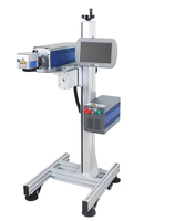 Machine de codage laser CO2 haute vitesse en ligne pour la date de production et le numéro de lot automatique des produits laitiers et des boissons Imprimante graveuse laser CO2
