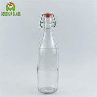Bouteilles en verre rondes personnalisées par le fabricant, 250 ml, 500 ml, 750 ml, 1000 ml, avec bouchon à clip pivotant pour l'eau, les jus, les boissons, l'huile, les spiritueux