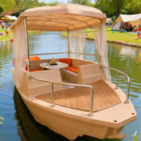 Bateau électrique de style nouveau pour la navigation de plaisance et les activités nautiques, bateau de loisirs avec table et auvent pour les goûters sur le lac