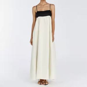 เดรสยาวดีไซน์ใหม่คุณภาพสูง เรียบหรู สายเดี่ยว เซ็กซี่ เหมาะสำหรับใส่ไปทะเล ฤดูร้อน สีดำ สีขาว ผ้าลินิน - Product Image 1