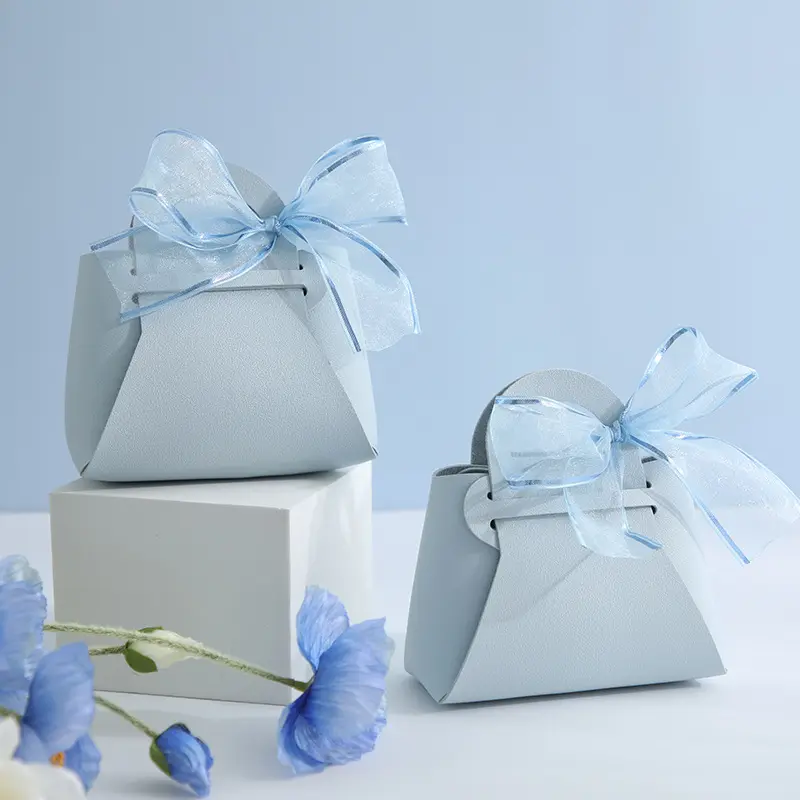 ใหม่งานแต่งงานที่เรียบง่ายมือถือถุงขนมริบบิ้นของขวัญกระเป๋าขายส่งงานแต่งงานแขกหนังถุงของขวัญ