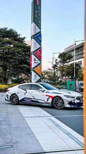 Kit carrosserie pour BMW Série 8 G14, style TAKD amélioré, en fibre de carbone, comprenant lèvre avant, jupes latérales, diffuseur et spoiler - Product Image 3