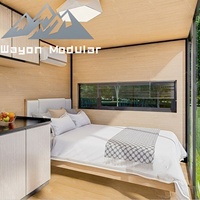 Villa préfabriquée de luxe de deux étages à structure en acier sur mesure Wayon avec pilotis en V pour jardin résidentiel