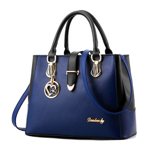 Bolso de Mano para Mujer 2022, Nuevo Estilo Coreano, Bolso de Hombro con Forma de Corazón y Borlas, Bolso de Moda - Product Image 2
